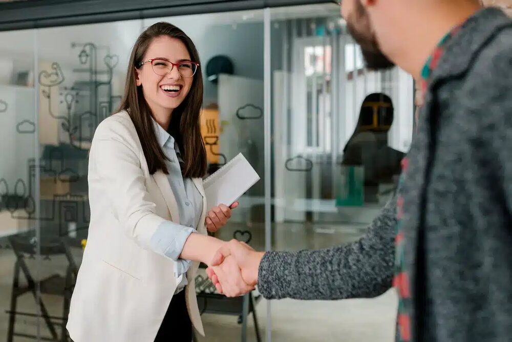 A client and a consultant reviewing a shortlist